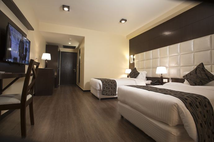 Imagen de la habitación del Hotel United Business. Foto 2
