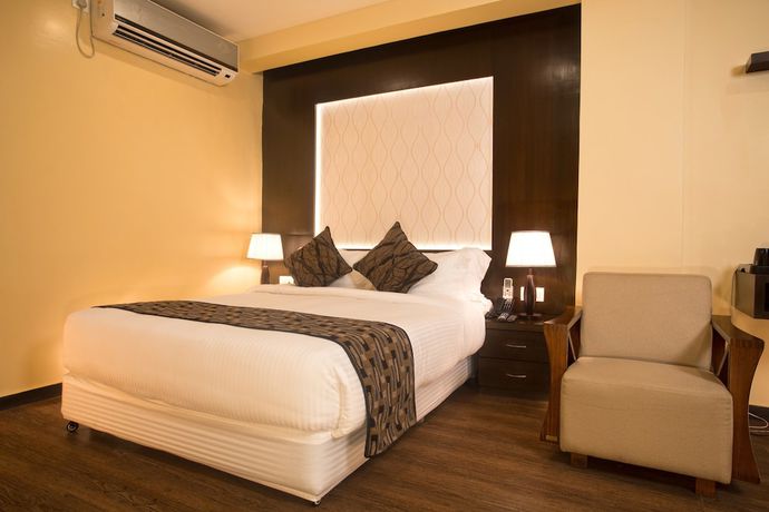 Imagen de la habitación del Hotel United Business. Foto 4