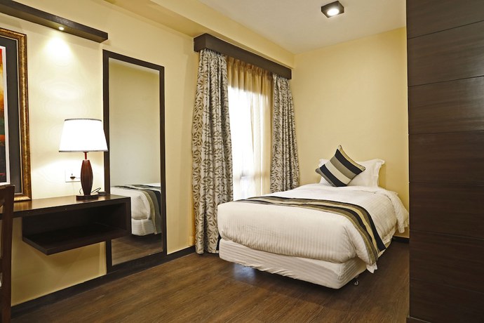 Imagen de la habitación del Hotel United Business. Foto 13
