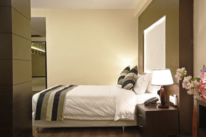 Imagen de la habitación del Hotel United Business. Foto 15