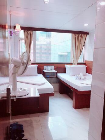 Imagen general del Hotel United Co-Operate Guest House (7/F). Foto 4