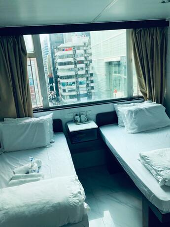 Imagen general del Hotel United Co-Operate Guest House (7/F). Foto 7
