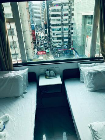 Imagen general del Hotel United Co-Operate Guest House (7/F). Foto 14