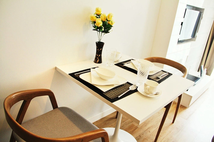 Imagen de la habitación del Hotel United Residence Ekamai Bangkok. Foto 3