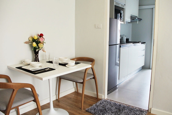 Imagen de la habitación del Hotel United Residence Ekamai Bangkok. Foto 4