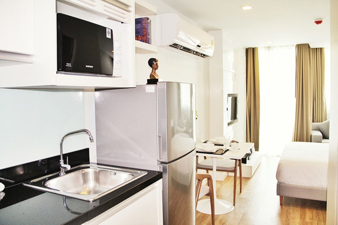 Imagen de la habitación del Hotel United Residence Ekamai Bangkok. Foto 5