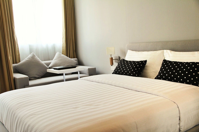 Imagen de la habitación del Hotel United Residence Ekamai Bangkok. Foto 9
