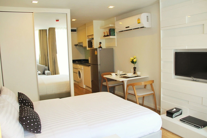 Imagen de la habitación del Hotel United Residence Ekamai Bangkok. Foto 10