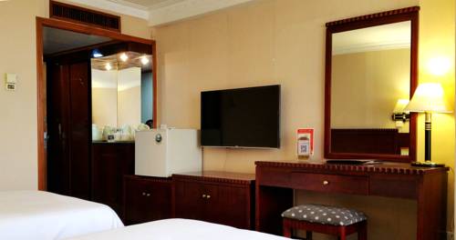 Imagen de la habitación del Hotel United Star Business. Foto 4