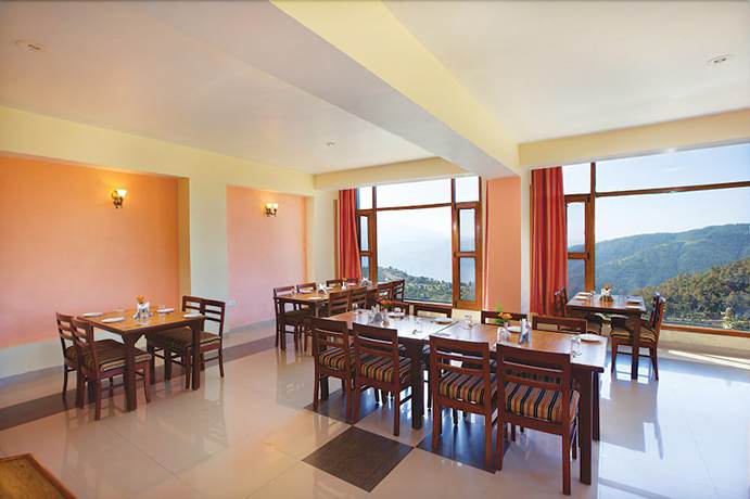 Imagen del bar/restaurante del Hotel United-21 Resort. Foto 4