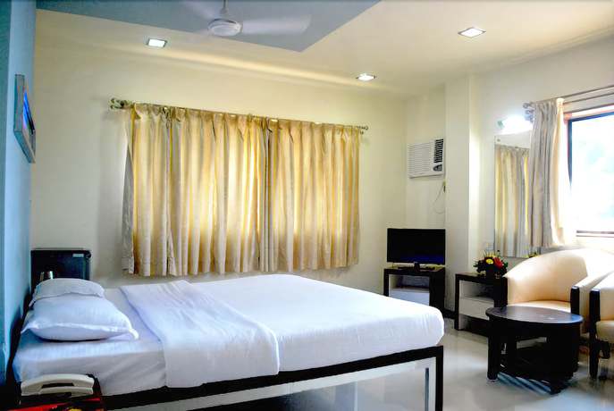 Imagen de la habitación del Hotel United-21 Sagar Kinara. Foto 8