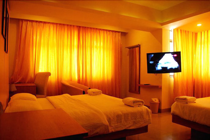 Imagen de la habitación del Hotel United-21 Sagar Kinara. Foto 9