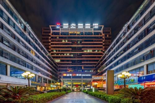 Imagen general del Hotel Unitour, Nanning International Convention and Exhibition Center Jinhu Plaza. Foto 1