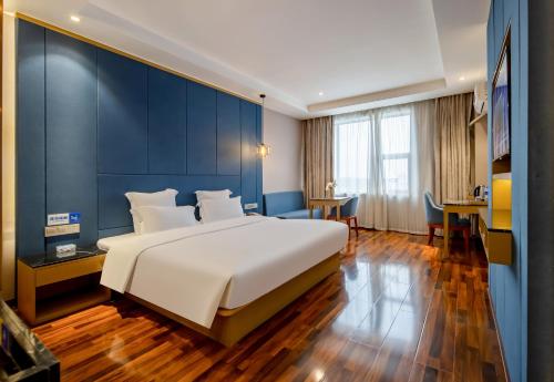 Imagen de la habitación del Hotel Unitour, Nanning Jiuqu Wan Hot Spring. Foto 8