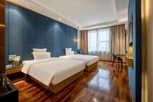 Imagen de la habitación del Hotel Unitour, Nanning Jiuqu Wan Hot Spring. Foto 9