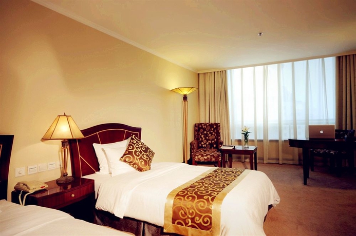 Imagen de la habitación del Hotel Universal Grand Romance Hotel. Foto 3