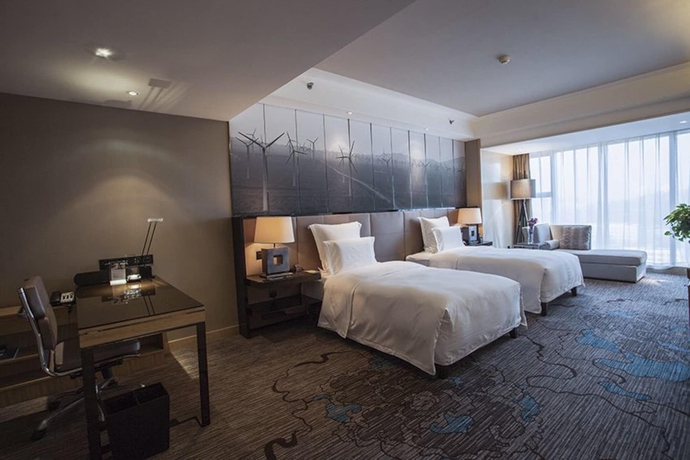 Imagen de la habitación del Hotel Universal Urumqi. Foto 13