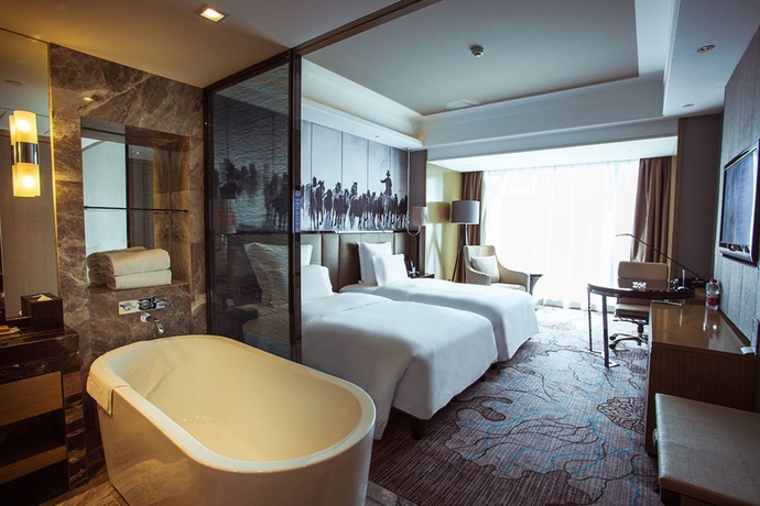 Imagen de la habitación del Hotel Universal Urumqi. Foto 14