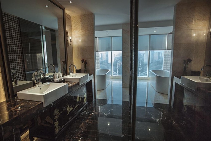 Imagen de la habitación del Hotel Universal Urumqi. Foto 17