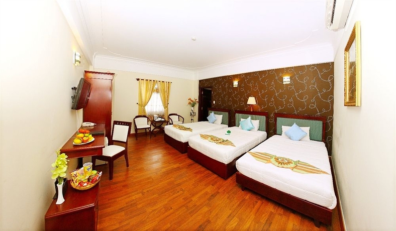 Imagen de la habitación del Hotel Universe Central Hotel Saigon. Foto 2