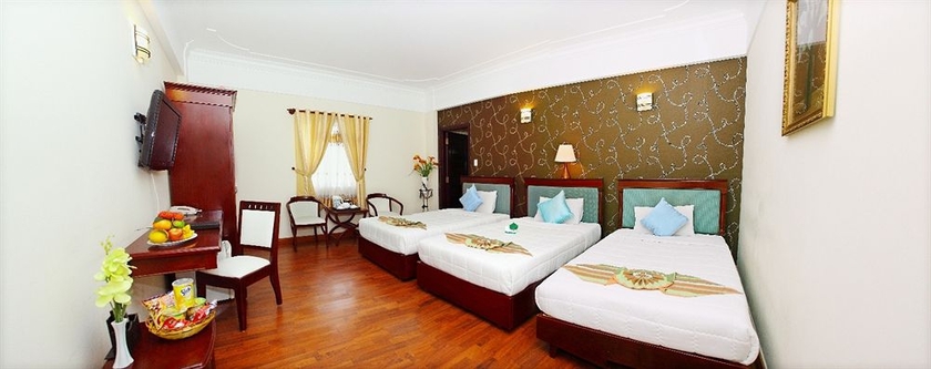 Imagen de la habitación del Hotel Universe Central Hotel Saigon. Foto 5