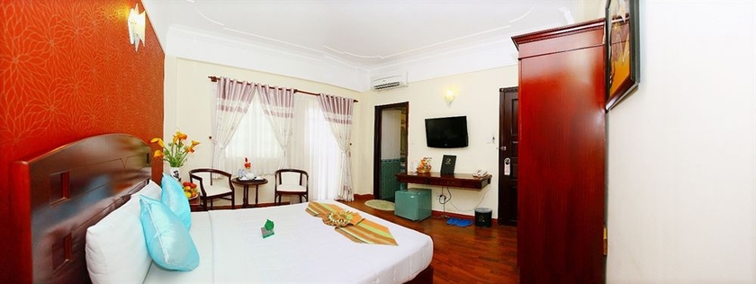 Imagen de la habitación del Hotel Universe Central Hotel Saigon. Foto 7