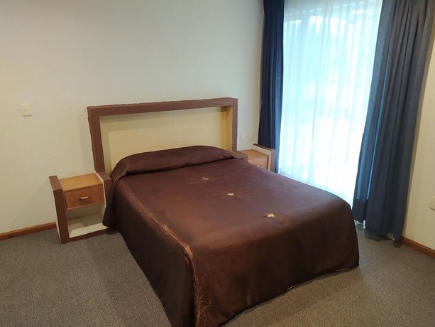 Imagen de la habitación del Hotel Universitario UAEH. Foto 9