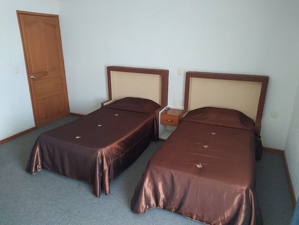 Imagen de la habitación del Hotel Universitario UAEH. Foto 10