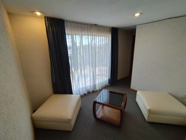 Imagen de la habitación del Hotel Universitario UAEH. Foto 11
