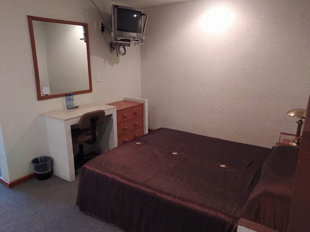 Imagen de la habitación del Hotel Universitario UAEH. Foto 13
