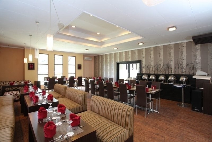 Imagen del bar/restaurante del Hotel University Club Ugm. Foto 4