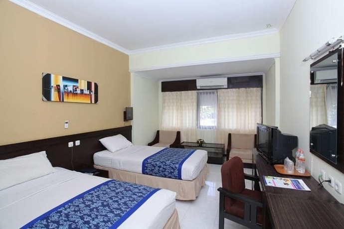 Imagen de la habitación del Hotel University Club Ugm. Foto 9
