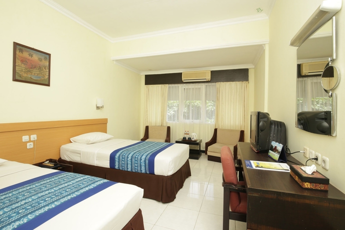 Imagen de la habitación del Hotel University Club Ugm. Foto 11