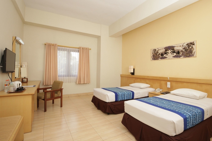 Imagen de la habitación del Hotel University Club Ugm. Foto 12