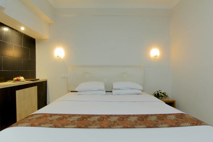 Imagen de la habitación del Hotel University, Depok. Foto 6