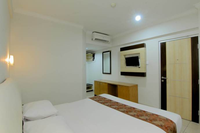 Imagen de la habitación del Hotel University, Depok. Foto 11