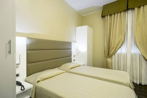 Imagen de la habitación del Hotel University. Foto 12