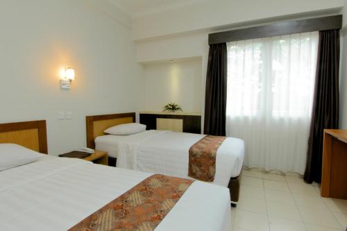 Imagen de la habitación del Hotel University Yogyakarta. Foto 15