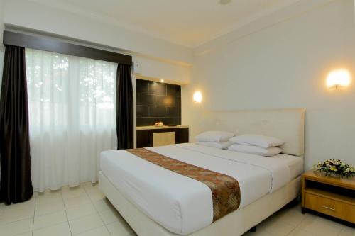 Imagen de la habitación del Hotel University Yogyakarta. Foto 17