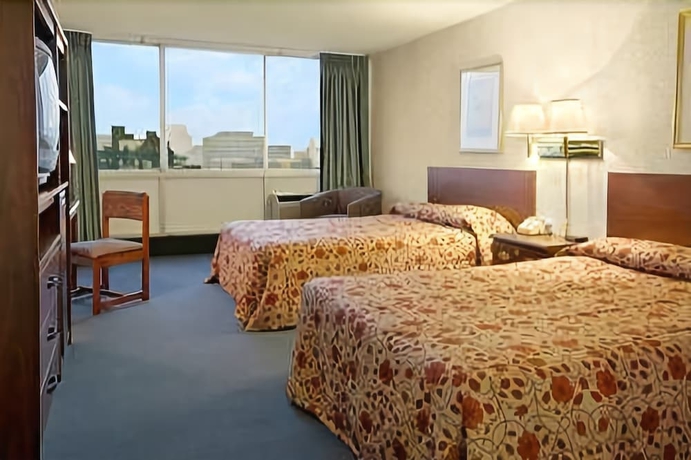 Imagen de la habitación del Hotel University and Suites. Foto 9