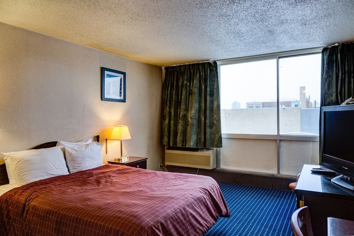 Imagen de la habitación del Hotel University and Suites. Foto 11
