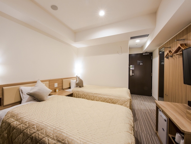 Imagen de la habitación del Hotel Unizo Inn Kobe Sannomiya. Foto 2