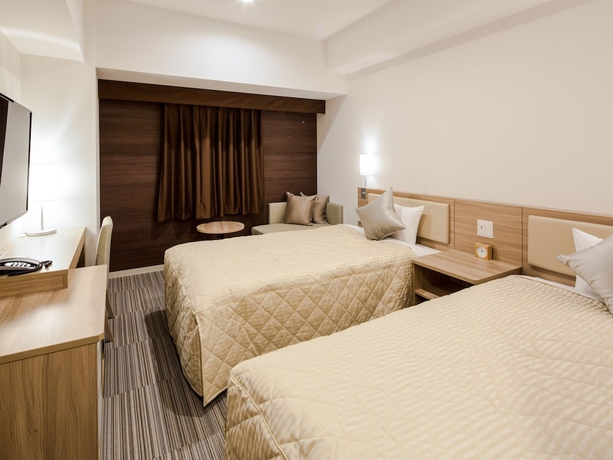 Imagen de la habitación del Hotel Unizo Inn Kobe Sannomiya. Foto 4