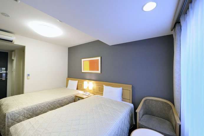 Imagen de la habitación del Hotel Unizo Inn Tokyo Hatchobori. Foto 3