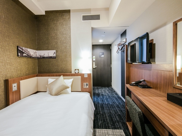 Imagen de la habitación del Hotel Unizo Osaka Umeda. Foto 2