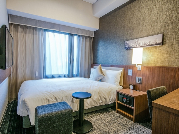 Imagen de la habitación del Hotel Unizo Osaka Umeda. Foto 8