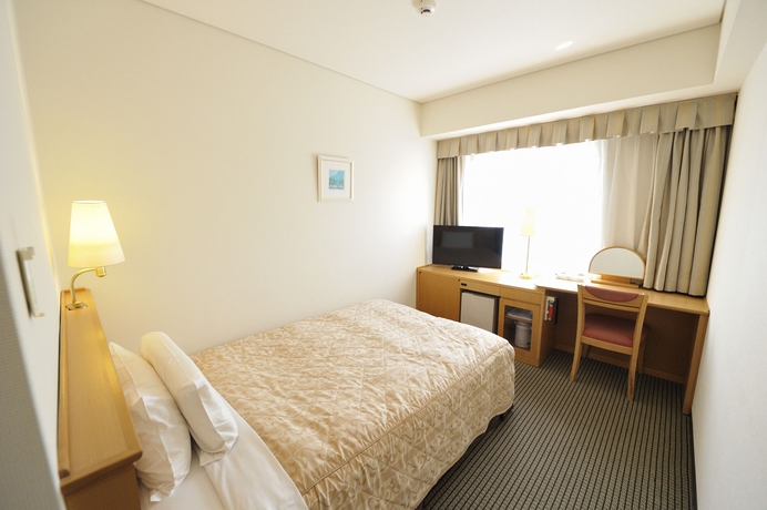 Imagen de la habitación del Hotel Unizo Shinbashi. Foto 11