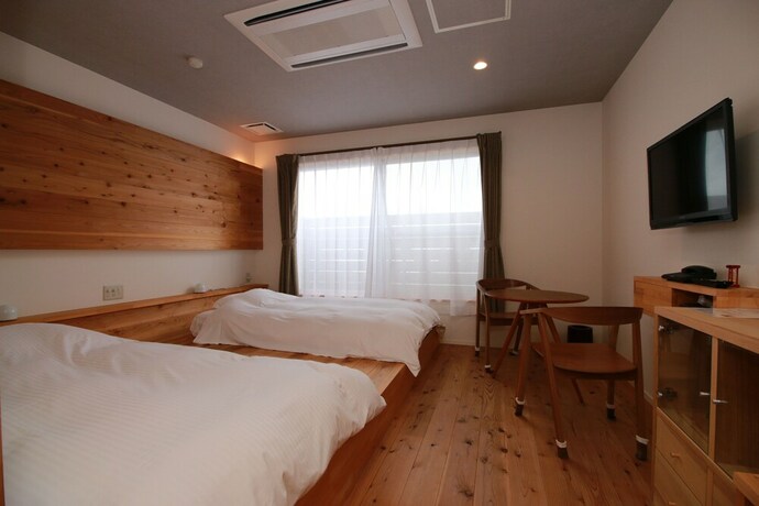 Imagen de la habitación del Hotel Unoshima Villa. Foto 21
