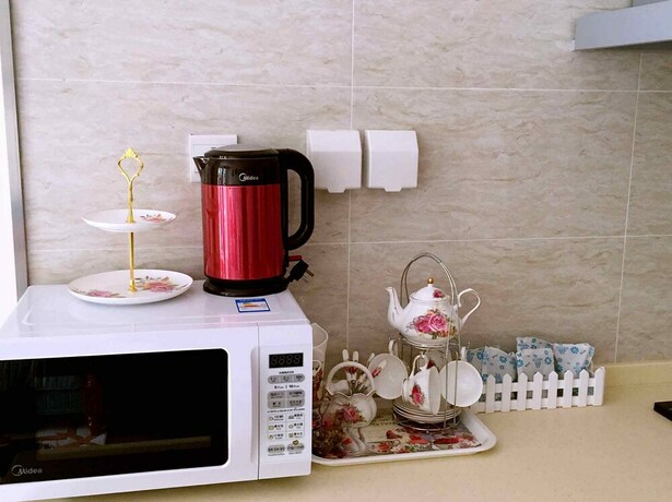 Imagen de la habitación del Hotel Unwind Moments Inn - Gubei Water Town. Foto 14