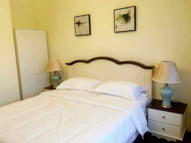 Imagen de la habitación del Hotel Unwind Moments Inn - Gubei Water Town. Foto 17